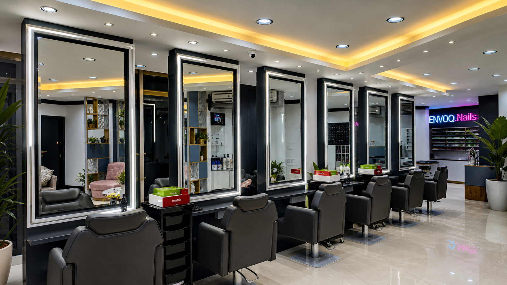 Envoq Salon styling area with illuminated mirrors and chairs